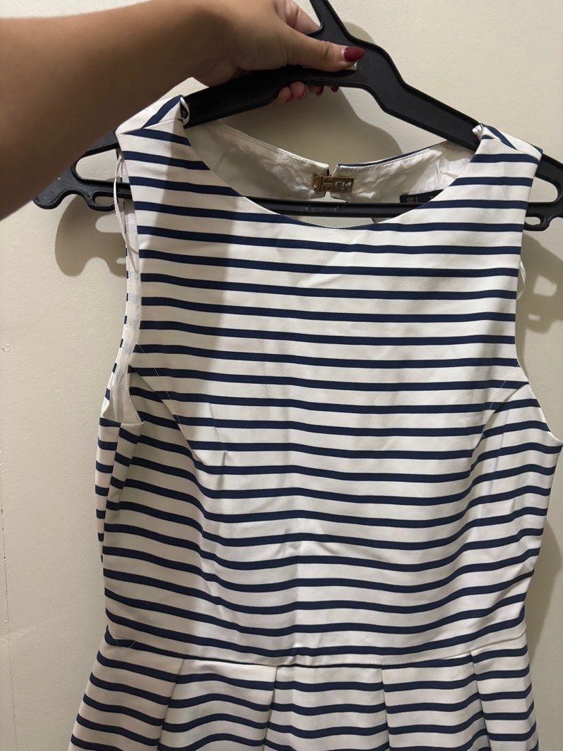 ❗️Zara ❗️Basic Striped mini Dress backless (Category: Dresses) located in Mandaluyong City. Submitted by Marie (Listing ID 1415065931, Image 1). Description: - Sleeveless striped dress - super good quality - Navy and white color - Scoop neckline - Back cutout detail - Fitted waist - Pleated skirt - Back zipper closure - Size S.