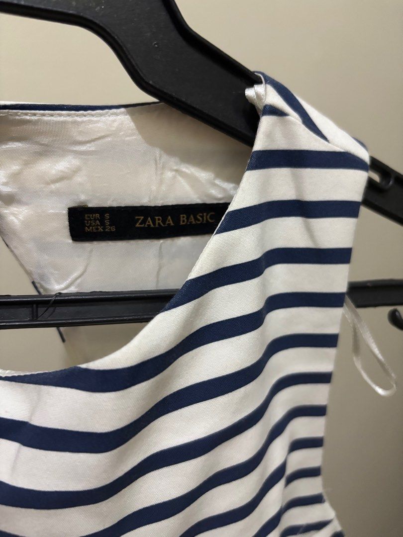 ❗️Zara ❗️Basic Striped mini Dress backless (Category: Dresses) located in Mandaluyong City. Submitted by Marie (Listing ID 1415065931, Image 3). Description: - Sleeveless striped dress - super good quality - Navy and white color - Scoop neckline - Back cutout detail - Fitted waist - Pleated skirt - Back zipper closure - Size S.