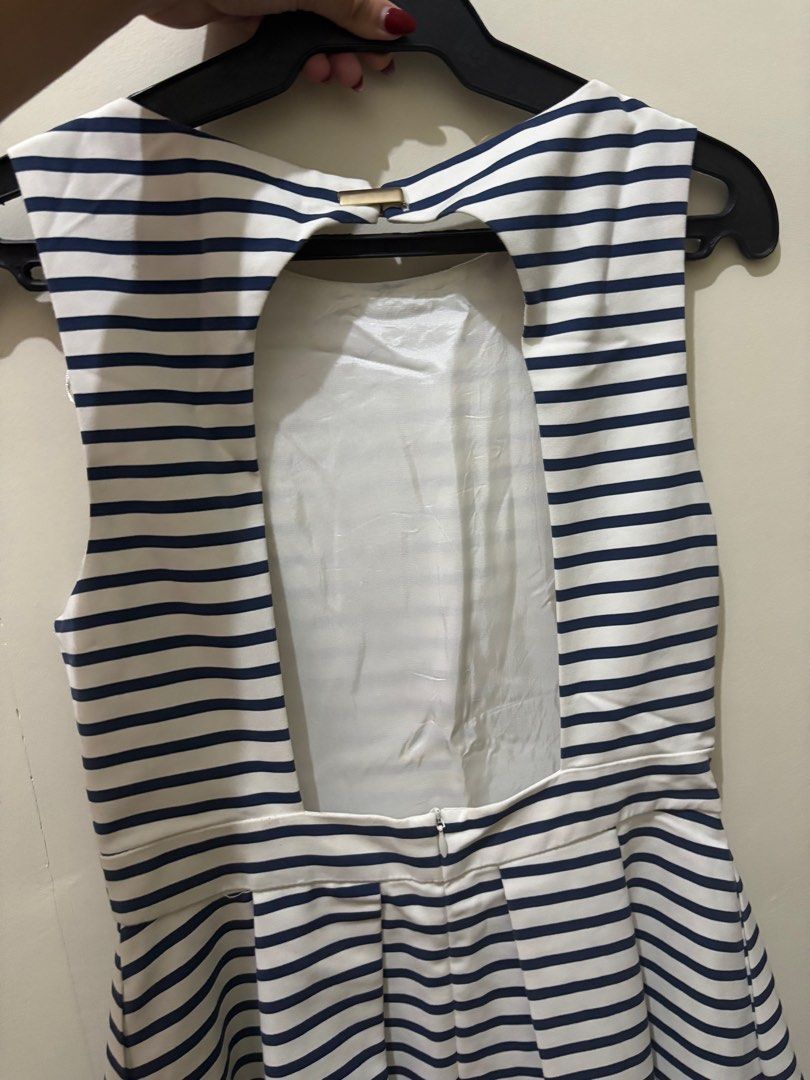 ❗️Zara ❗️Basic Striped mini Dress backless (Category: Dresses) located in Mandaluyong City. Submitted by Marie (Listing ID 1415065931, Image 2). Description: - Sleeveless striped dress - super good quality - Navy and white color - Scoop neckline - Back cutout detail - Fitted waist - Pleated skirt - Back zipper closure - Size S.