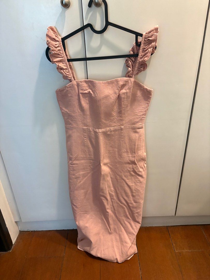 Zoo Label Pink Ruffle Strap Dress (Category: Dresses) located in Manila. Submitted by caarii (Listing ID 1415057566, Image 1). Description: Zoo pink midi dress. Features ruffle straps, square neckline, and fitted silhouette. Textured fabric..