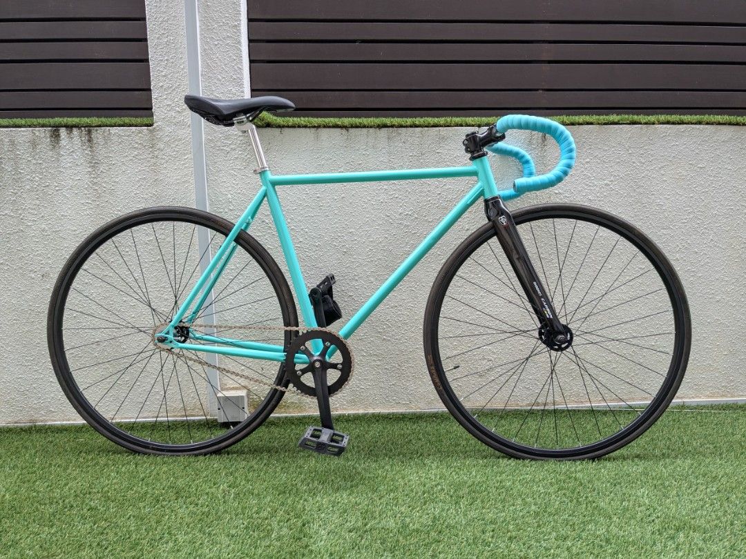 Fixed gear (Category: Bicycles) located in Singapore. Submitted by mistergeng (Listing ID 1403055921, Image 3). Description: - 52cm steel frame - Dodici 3K Carbon fiber fork - 44-by-17 fixed drive train - Double fixed rear hub, 13T/17T. Permanently affixed. - Cinema CK pedals with thick canvas straps - 25.4mm-22.2mm aluminium drop bars - 25.4mm diameter seatpost tube - Compass 700c x 23mm tyres, French valve - BSA 68mm x 103mm cartridge bottom br