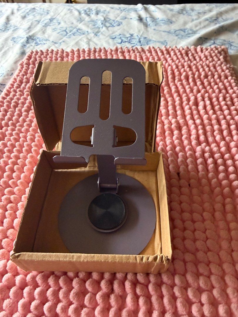 All-Metal 360° Rotating Phone Stand (Category: Mounts & Holders) located in Paranaque City. Submitted by tellimcloset23 (Listing ID 1415351432, Image 3). Description: - 360-degree rotating all-metal phone stand. - Securely holds mobile phones. - Sturdy base for stability. - Adjustable arm for optimal viewing angles. - Suitable for various phone sizes. - Sleek and modern design..