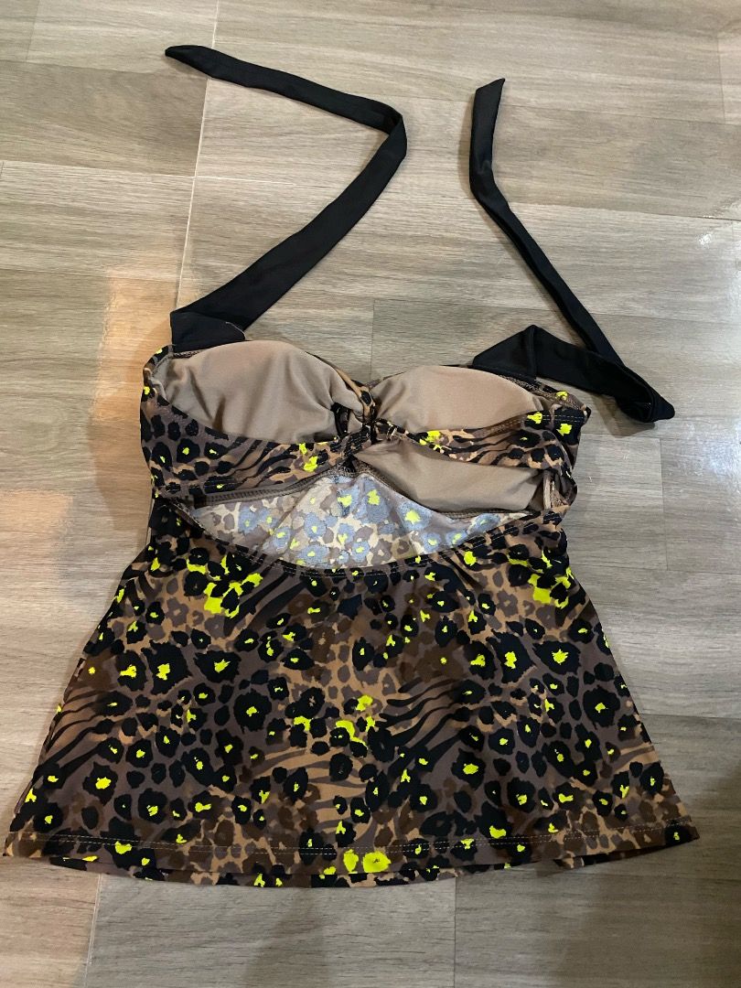Animal Print Halter Tank Top (Category: Sleeveless) located in Quezon City. Submitted by wompybat (Listing ID 1415359993, Image 2). Description: Animal Print Halter Tank Top - Bought in Lander's - Soft, stretchy, and lightweight material - Open back - Halter tie top - Used once - Price negotiable - Fits: S-M Meet-up Location: Quezon City .