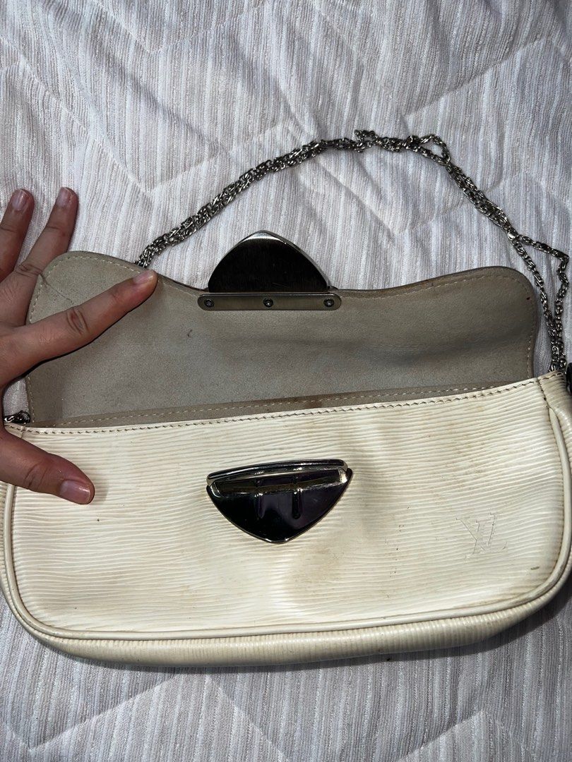 Authentic Louis Vuitton Montaigne Epi Leather Clutch (Category: Luxury Bags & Wallets) located in Rizal. Submitted by kmcafashion7 (Listing ID 1415283406, Image 3). Description: - Authentic LV Epi Leather Bag - Dimensions : Width: 27cm, Height: 11cm, Length: 6cm - Code TH1027 - Chain strap provided - lots of flaws. Please see all photos - Dustbag provided - Recolor to black for unnoticeable flaws - Tiny holes .