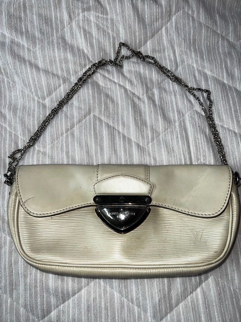 Authentic Louis Vuitton Montaigne Epi Leather Clutch (Category: Luxury Bags & Wallets) located in Rizal. Submitted by kmcafashion7 (Listing ID 1415283406, Image 1). Description: - Authentic LV Epi Leather Bag - Dimensions : Width: 27cm, Height: 11cm, Length: 6cm - Code TH1027 - Chain strap provided - lots of flaws. Please see all photos - Dustbag provided - Recolor to black for unnoticeable flaws - Tiny holes .
