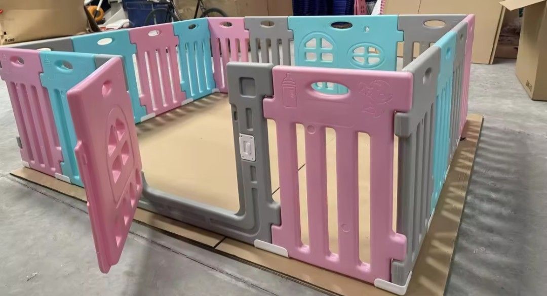Baby Playpen with Door (Category: Infant Playtime) located in Paranaque City. Submitted by mystuffmel (Listing ID 1415316253, Image 1). Description: - Colorful design with pink, blue, and gray panels - Features a door for easy access - Includes window-shaped cutouts - Made of durable plastic - Creates a safe play area for babies and toddlers -14 panels and 2 doors MOP:GCASH only item on hand NO COD.