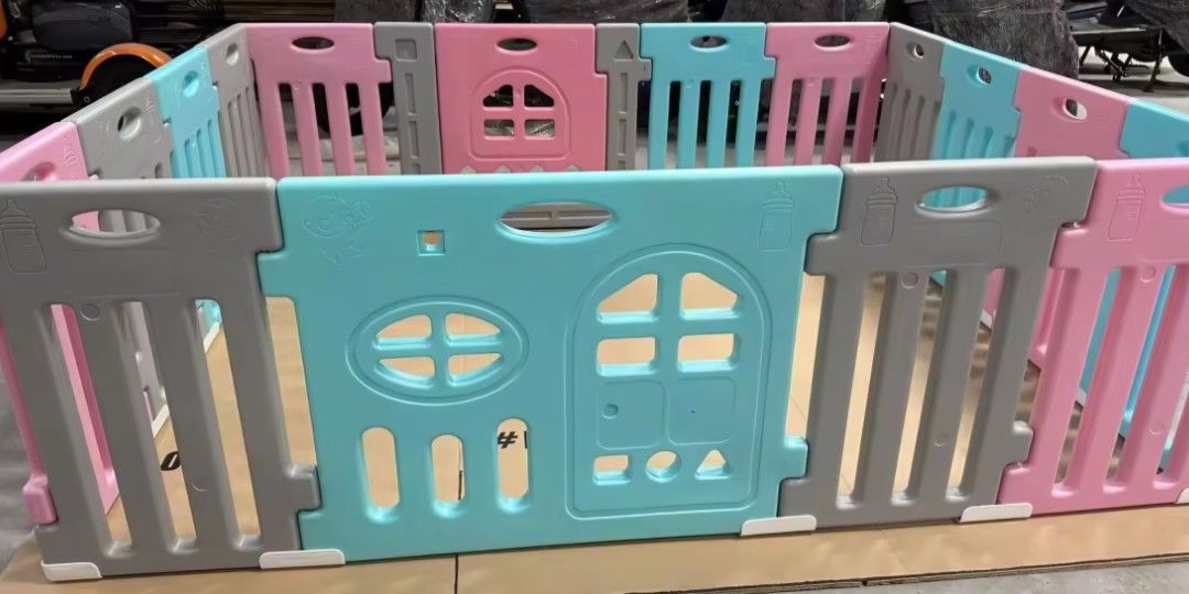 Baby Playpen with Door (Category: Infant Playtime) located in Paranaque City. Submitted by mystuffmel (Listing ID 1415316253, Image 2). Description: - Colorful design with pink, blue, and gray panels - Features a door for easy access - Includes window-shaped cutouts - Made of durable plastic - Creates a safe play area for babies and toddlers -14 panels and 2 doors MOP:GCASH only item on hand NO COD.