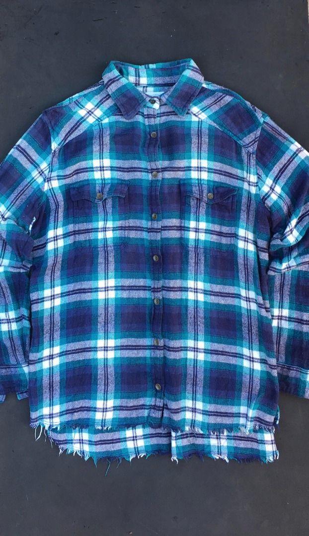 Billabong Plaid Flannel Shirt (Category: Tshirts & Polo Shirts ) located in Cebu City. Submitted by brightcrystal-fe18c1 (Listing ID 1415385299, Image 1). Description: - Billabong flannel shirt - Classic blue and white plaid pattern - Features two chest pockets - Button-down front - Stylish frayed hem - Includes 'Emergency Button' detail.