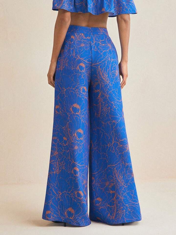 Blue Boho Floral Wide Legged Pants for Summer (Category: Other Bottoms) located in Manila. Submitted by clarv (Listing ID 1415357850, Image 2). Description: Thick and pretty Size on tag: Small (swipe to see size guide) Brand new- never used .