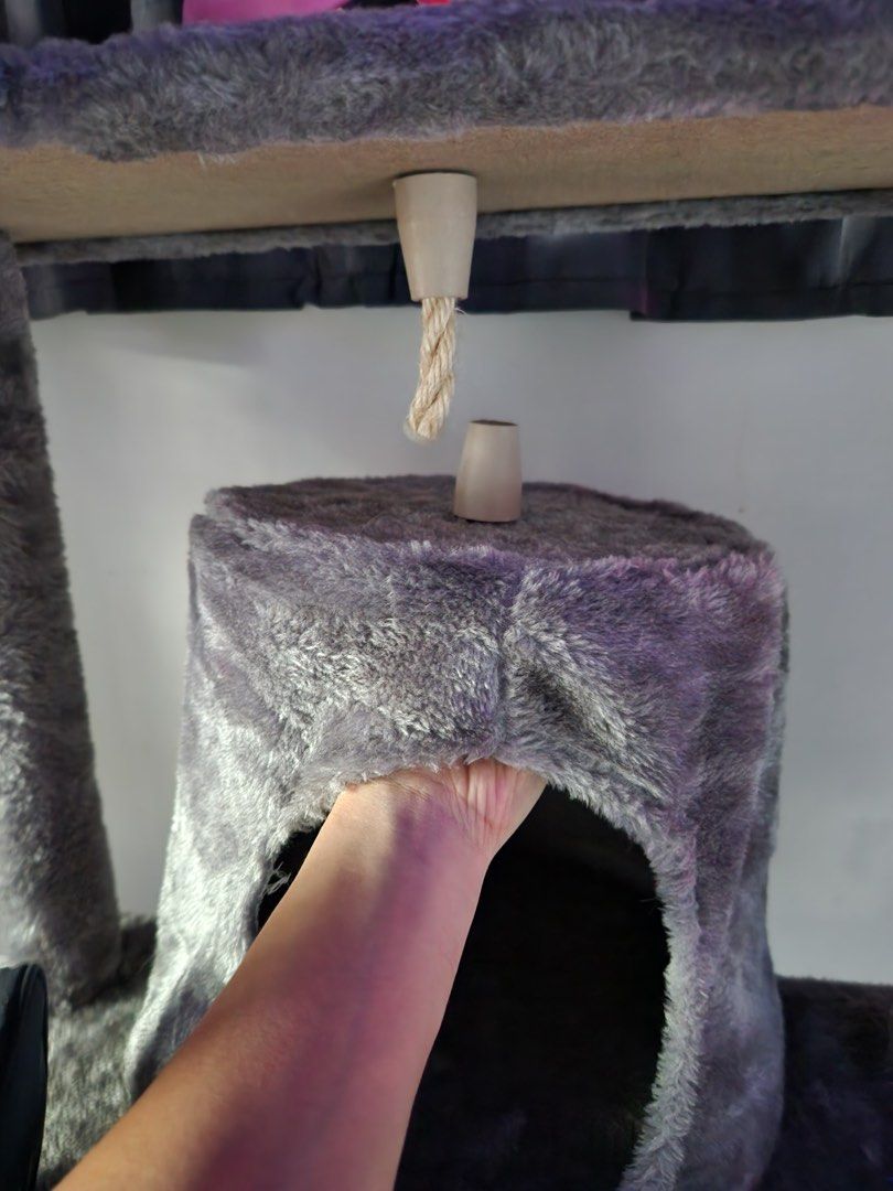 Cat Condo with Scratching Post (Category: Homes & Other Pet Accessories) located in Manila. Submitted by thwolf (Listing ID 1415325889, Image 3). Description: Selling my multi-level cat condo. (Around 6 feet in height) Bought it from Pet Express over a month ago, so it’s relatively new. Assembly tools and instructions included. Original price: PHP 7,499 (Check receipt on the last photo) RFS: My cats barely play with it. Issue: The hanging hideout