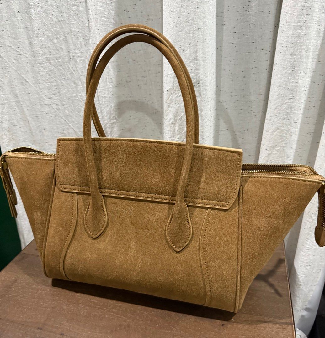 Celine luggage tote medium suede light brown (Category: Shoulder Bags) located in Cebu City. Submitted by refabph (Listing ID 1415400727, Image 3). Description: Celine Material: Suede leather Hardware: Gold-tone Made in: Italy Phoebe Philo era Condition: - Good pre-owned condition - Natural wear and patina to the suede - Structure remains intact and stitching is clean throughout - Please review photos for detailed condition. - slightly negotiable