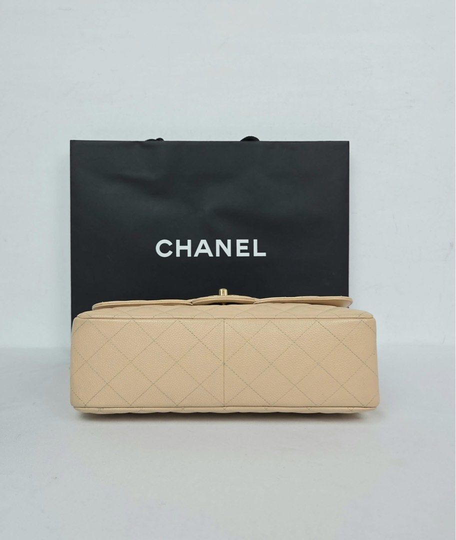 Chanel Classic Flap Bag Beige (Category: Luxury Bags & Wallets) located in Angeles City. Submitted by nikki.tan444 (Listing ID 1415333854, Image 3). Description: - Chanel Classic Flap Bag - Beautiful beige color - Iconic diamond quilting - Gold-tone chain strap - Includes dust bag and authenticity card - Minimal signs of wear - Perfect for any occasion.
