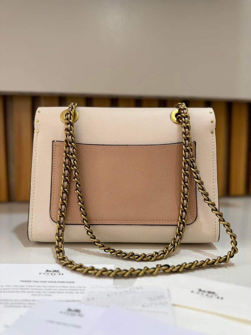 Coach Parker bGa (Category: Luxury Bags & Wallets) located in Manila. Submitted by squirtybabyy (Listing ID 1415355154, Image 2). Description: Authentic Coach Parker Bag (Crossbody / Shoulder bag) Condition: 6/10 (pm for picture of flaws) with dustbag & authentication cards ₱2000 (can give lp for sure buyer) No returns/exchanges.