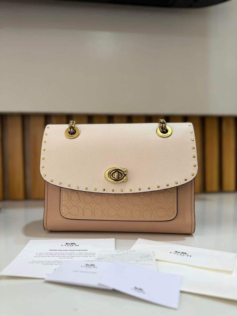 Coach Parker bGa (Category: Luxury Bags & Wallets) located in Manila. Submitted by squirtybabyy (Listing ID 1415355154, Image 1). Description: Authentic Coach Parker Bag (Crossbody / Shoulder bag) Condition: 6/10 (pm for picture of flaws) with dustbag & authentication cards ₱2000 (can give lp for sure buyer) No returns/exchanges.