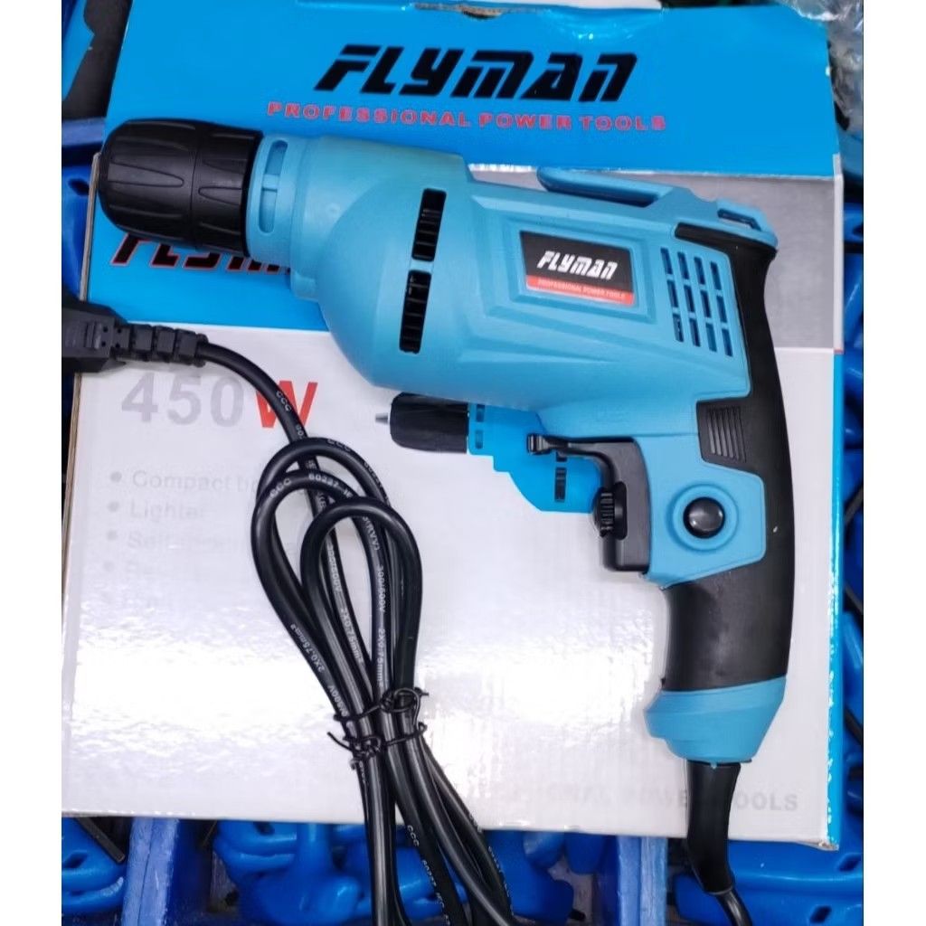 Flyman 450W Power Drill (Category: Construction Tools & Equipment) located in Quezon City. Submitted by makibee (Listing ID 1415271808, Image 1). Description: - Flyman power drill - 450W motor - Blue and black color - Compact and lightweight design - Includes power cord.