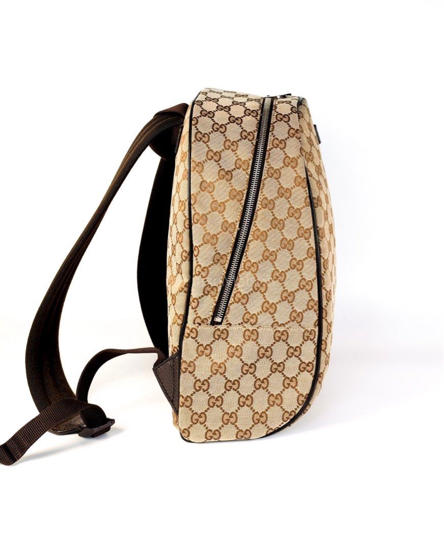 Gucci Backpack in Beige GG Supreme Canvas (Category: Luxury Bags & Wallets) located in Taguig. Submitted by closetcompany (Listing ID 1415320932, Image 3). Description: Gucci Backpack in Beige GG Supreme Canvas Price: Php 42,000.00 Condition: Excellent (9/10) Exterior: Minor lint on canvas, minor scuffs on the leather Interior: Mild signs of usage. Hardware: Hairline scratches. Inclusions: Generic Dust Bag. Entrupy Certificate of Authenticity. 10