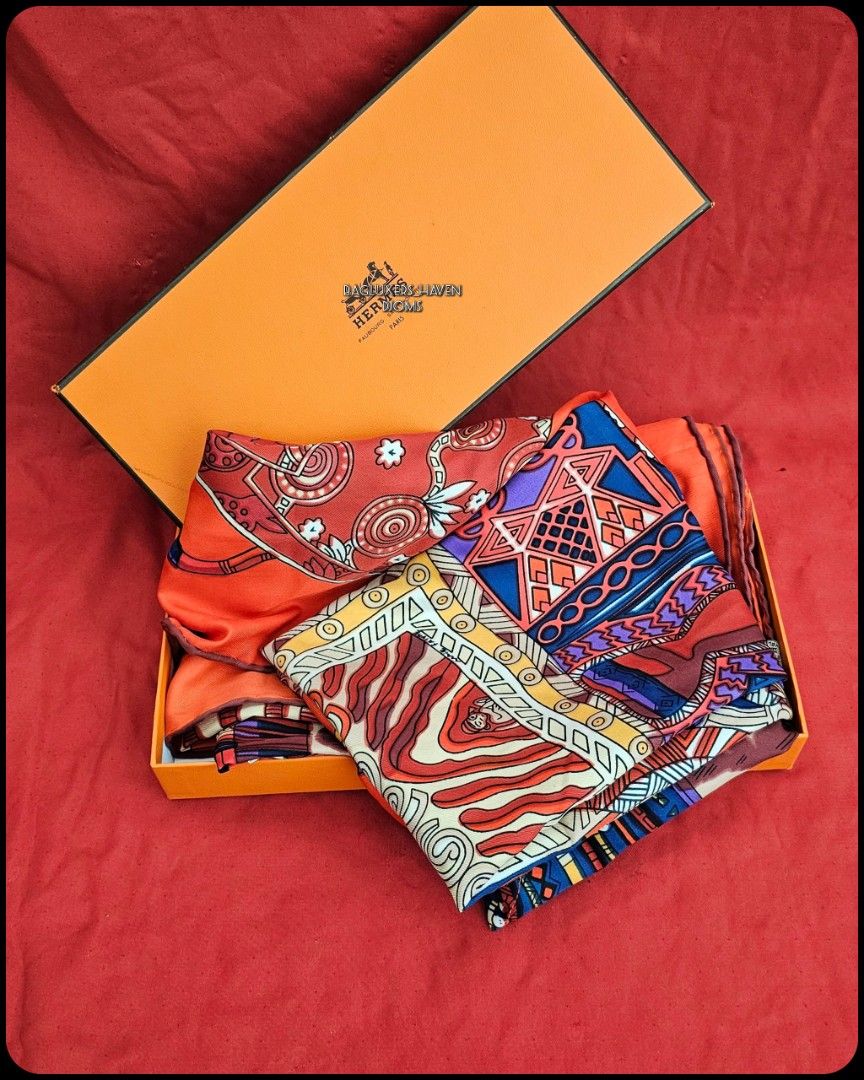 🛑Hermes Voyage En Etoffes Multicolor Wrap Around Shawl Scarf (Category: Scarves) located in Baguio. Submitted by bagluxers_haven (Listing ID 1415264219, Image 1). Description: 🛑Authentic Hermes Voyage En Etoffes by A. Favrie 127cm Wrap Around Handstitched Silk Shawl in Orange w/ Multicolor Graphic Clothing Pattern. 》Djom Djom Fb.. 🛑DIMENSION : 50" X 50" 🛑Like New, Excellent Condition w/ a Provided Box. 📩Do inquire if you need further assista