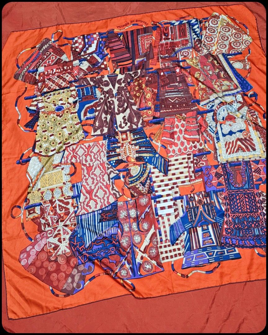 🛑Hermes Voyage En Etoffes Multicolor Wrap Around Shawl Scarf (Category: Scarves) located in Baguio. Submitted by bagluxers_haven (Listing ID 1415264219, Image 2). Description: 🛑Authentic Hermes Voyage En Etoffes by A. Favrie 127cm Wrap Around Handstitched Silk Shawl in Orange w/ Multicolor Graphic Clothing Pattern. 》Djom Djom Fb.. 🛑DIMENSION : 50" X 50" 🛑Like New, Excellent Condition w/ a Provided Box. 📩Do inquire if you need further assista