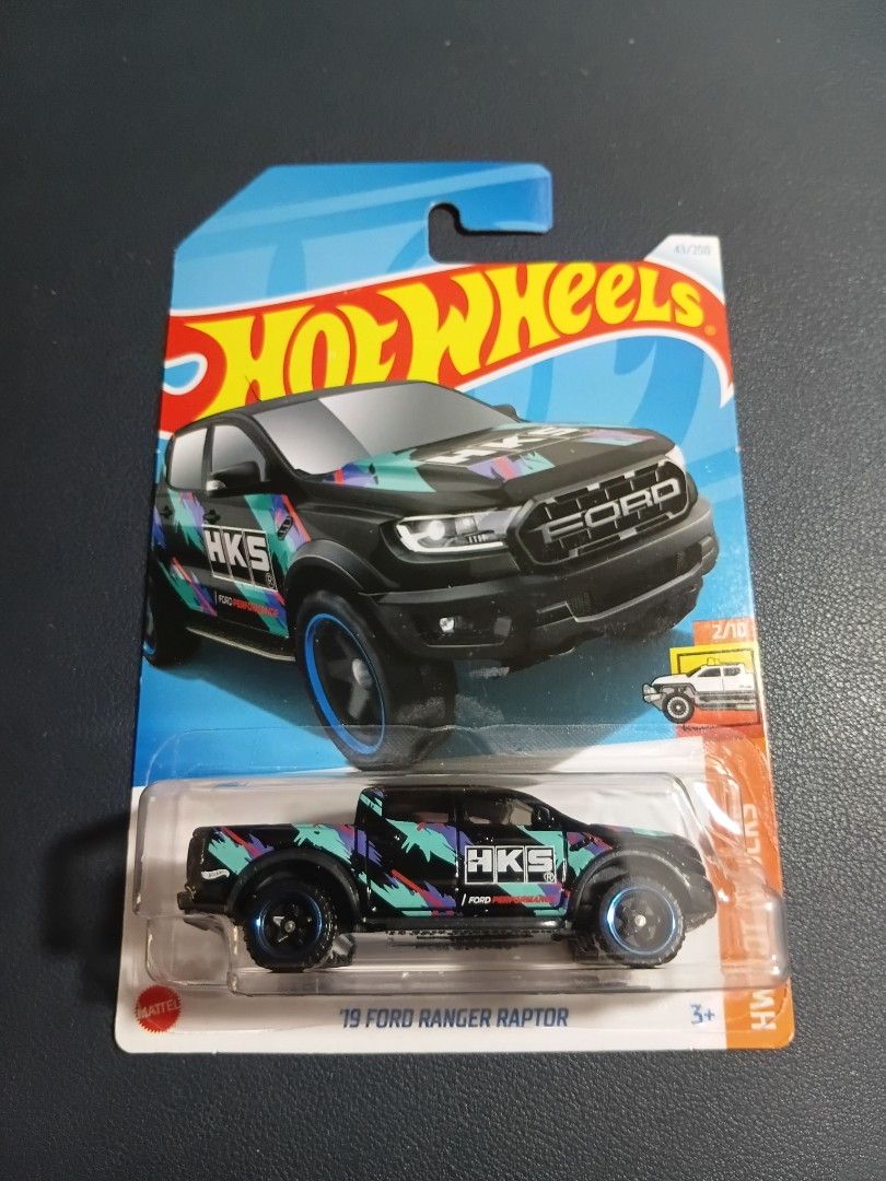 Hot Wheels 2019 Ford Ranger Raptor (Category: Vehicle & Diecast Models) located in Manila. Submitted by _mugen24 (Listing ID 1415282700, Image 1). Description: - 2019 Ford Ranger Raptor Hot Wheels diecast car - Black body with HKS and other graphics - Part of the HW Hot Trucks series - Number 2/10 in the series Can be delivered by Lalamove, Grab or J&T Shipping fee shouldered by buyer MOP: GCash, Gotym, BDO, Maya.