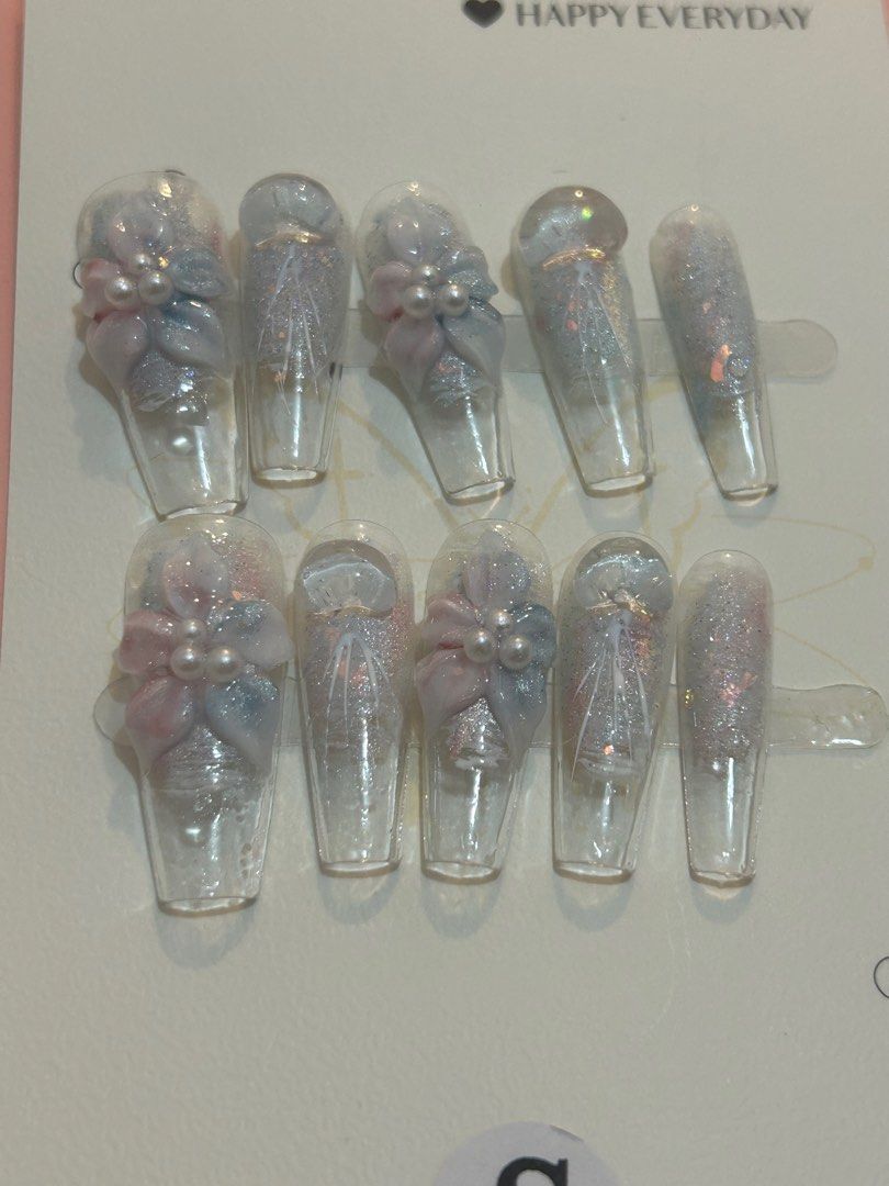 3D jellyfish and flowers Press-on nails (Category: Hands & Nails) located in Cavite. Submitted by i05mm (Listing ID 1415421190, Image 2). Description: Jellyfish and flower glitter clear press-on nails S size coffin nails Complete inclusions (alcohol pad, cuticle pusher, nail file, and sticky tabs).