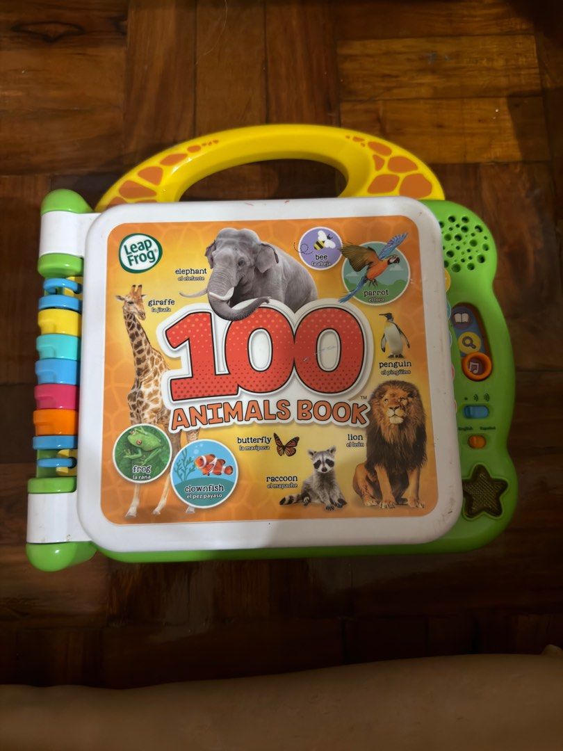 LeapFrog 100 Animals Book (Category: Children's Books) located in Quezon City. Submitted by lexieshuu162243 (Listing ID 1415388950, Image 1). Description: - LeapFrog 100 Animals Book - Interactive learning tool for kids - Features animals from desert, polar, ocean, rainforest, and more habitats - Colorful illustrations and engaging sound effects - Includes a handle for easy carrying - Buttons for interactive learning - Designed to teach children 