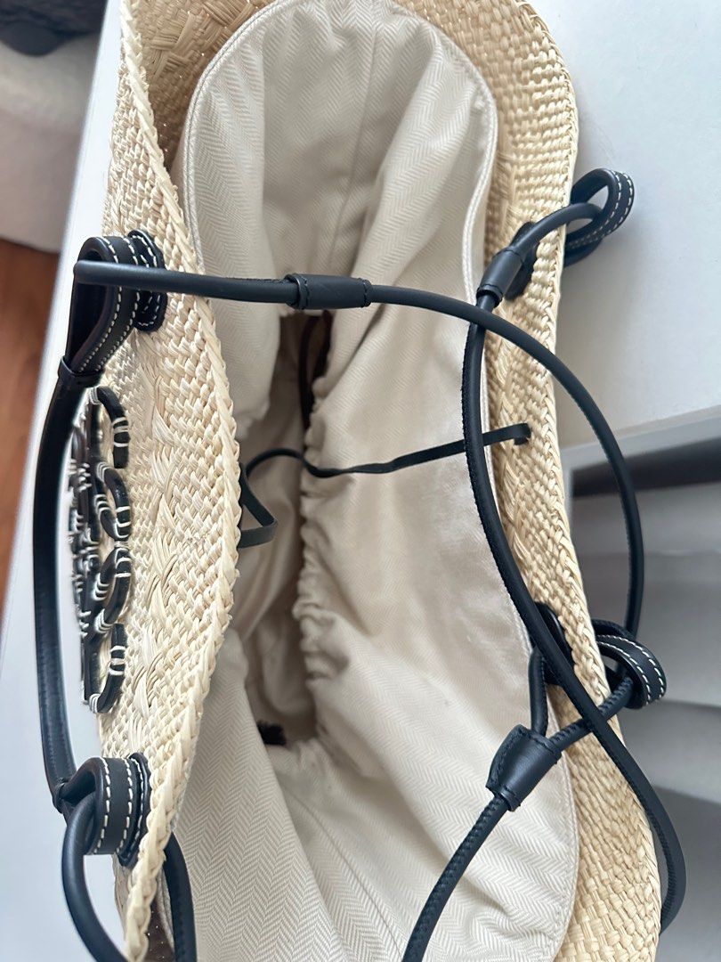 Loewe medium anagram basket bag (Category: Luxury Bags & Wallets) located in Cebu City. Submitted by sephoraly (Listing ID 1415321446, Image 2). Description: Medium Anagram Basket bag in iraca palm and calfskin Sign of usage but still in a very good condition Rank AB With receipt,dust bag, box & paper bag I bought it at Loewe Nustar Mall .