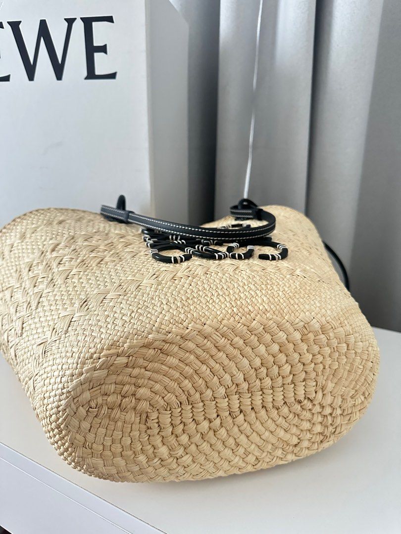 Loewe medium anagram basket bag (Category: Luxury Bags & Wallets) located in Cebu City. Submitted by sephoraly (Listing ID 1415321446, Image 3). Description: Medium Anagram Basket bag in iraca palm and calfskin Sign of usage but still in a very good condition Rank AB With receipt,dust bag, box & paper bag I bought it at Loewe Nustar Mall .