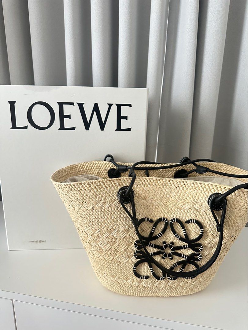 Loewe medium anagram basket bag (Category: Luxury Bags & Wallets) located in Cebu City. Submitted by sephoraly (Listing ID 1415321446, Image 1). Description: Medium Anagram Basket bag in iraca palm and calfskin Sign of usage but still in a very good condition Rank AB With receipt,dust bag, box & paper bag I bought it at Loewe Nustar Mall .