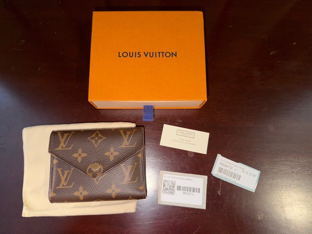Louis Vuitton Victorine Wallet (Category: Luxury Bags & Wallets) located in Quezon City. Submitted by maria_0405 (Listing ID 1415287546, Image 1). Description: Slightly used.