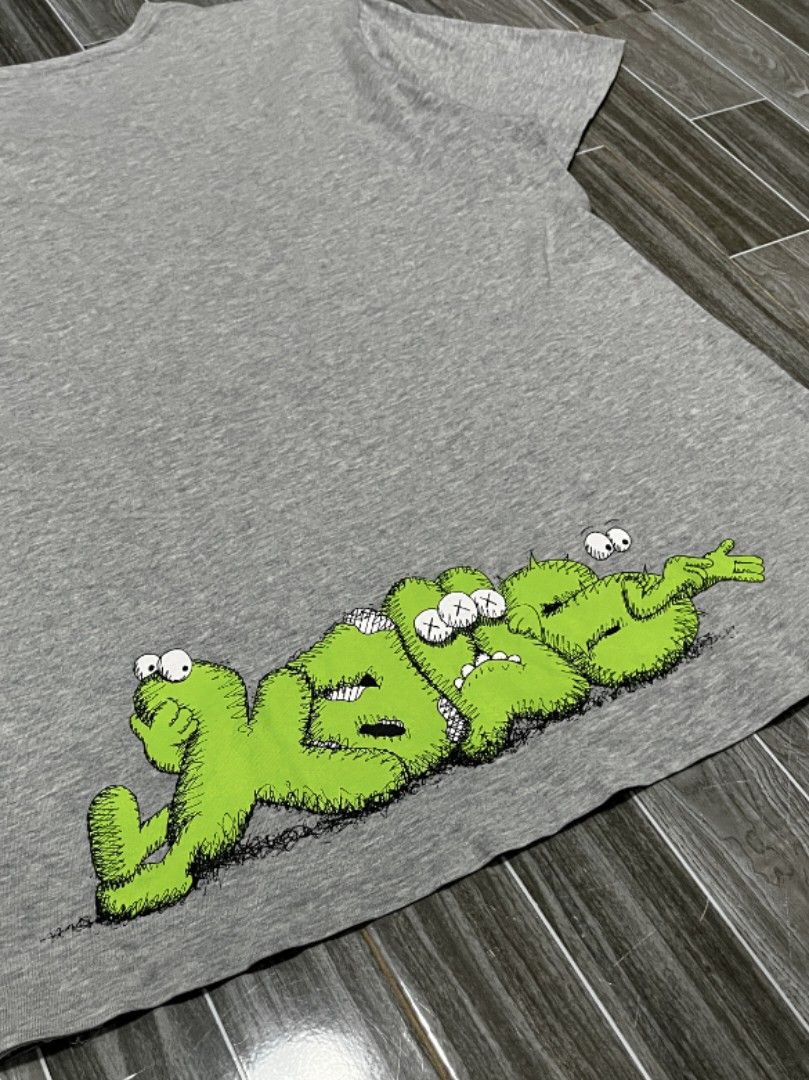 [MEDIUM] Uniqlo UT x Kaws Graphic Tee (Category: Tshirts & Polo Shirts ) located in Iligan City. Submitted by preems (Listing ID 1415367494, Image 3). Description: Size: Medium Actual Dimes: L-27 W-20 Overall Condition: 10/10 Iligan City, Lanao del Norte Location Shipping via J&T Express [100] plus shipping fee OBO ( or best offer).