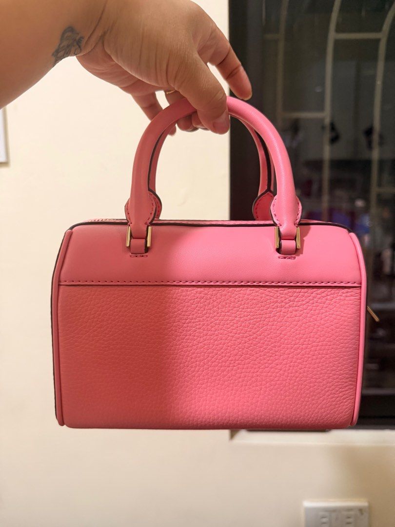 Michael Kors Mini Duffle (Category: Luxury Bags & Wallets) located in Manila. Submitted by authenticprelovedmnls (Listing ID 1415368559, Image 3). Description: Once used lang. Then display na. Orig 100% with tag Teal rose color🧡.