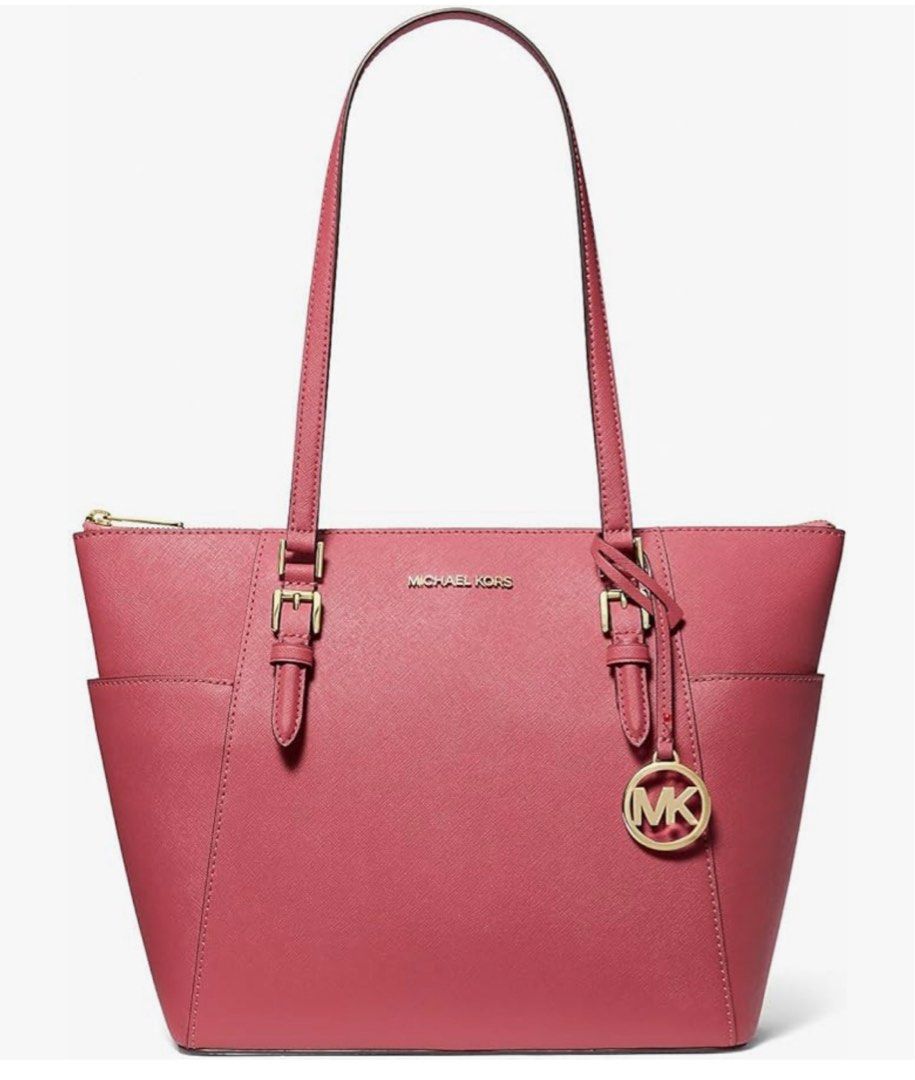 Michael Kors Tote Bag (Category: Luxury Bags & Wallets) located in Manila. Submitted by shop.amen (Listing ID 1415317025, Image 2). Description: Michael Kors Charlotte Large Top Zip Tote Bag in a pink or fuchsia color with gold-tone hardware. - Zip closure - Two side pockets - Light brown fabric lining - Detachable charm (personal, I will include it because it looks cute with the bag) - Two top handles.