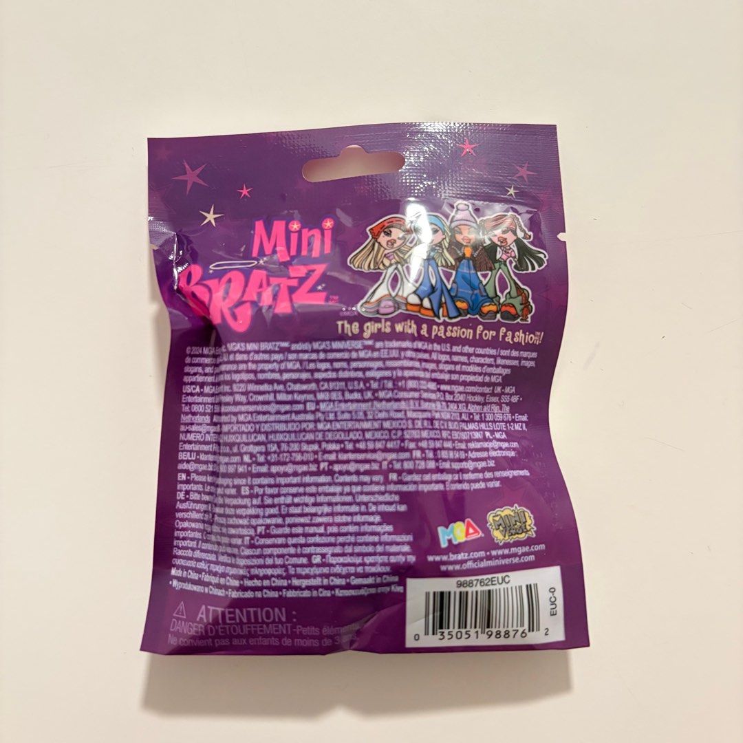 Mini Bratz Yasmin Doll (Category: Kids Toys) located in Quezon City. Submitted by gormbox (Listing ID 1415313352, Image 2). Description: - Sealed Mini Bratz Yasmin doll - Part of the 20th Anniversary collection - Comes in original packaging - Doll is in a clear plastic case inside a purple bag - Bag features Mini Bratz logo and doll images - Bag includes text and a barcode.