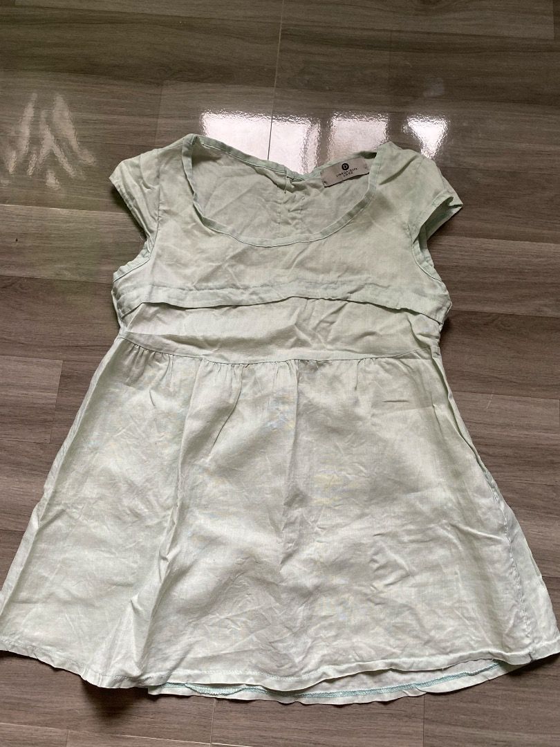 Mint Green Short-Sleeved Summer Top (Category: Sleeveless) located in Quezon City. Submitted by wompybat (Listing ID 1415333591, Image 1). Description: Mint Green Short-Sleeved Summer Top - Linen material; lightweight - With buttons at the back - Slightly flared hem - fits S-M Meet-up Location: Quezon City.