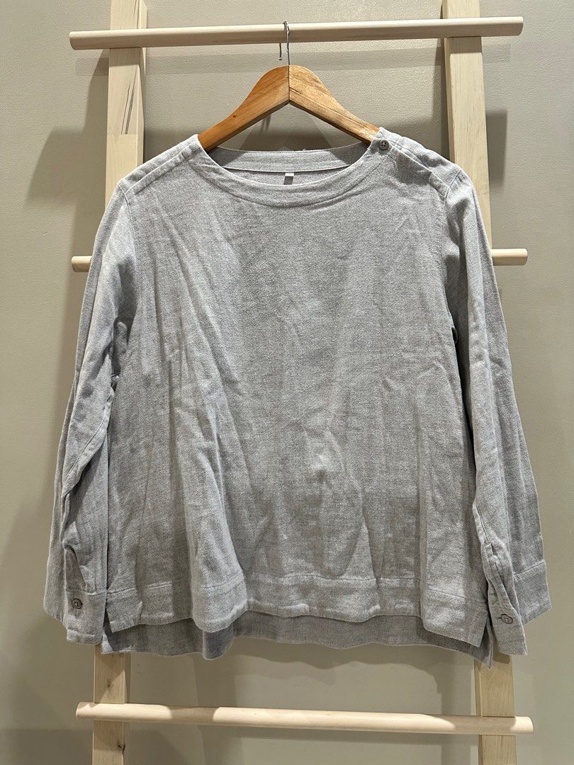 MUJI Long Sleeve Shirt (Category: Tshirts & Polo Shirts ) located in Quezon City. Submitted by alloriginalthrift (Listing ID 1415338909, Image 2). Description: - MUJI long sleeve shirt - Color: Light gray - Features: Round neckline, button cuffs & shoulder details - Material: 100% cotton - Fit: Relaxed - Perfect for casual wear - Measurements in photos Carefully washed and used. Very good condition..