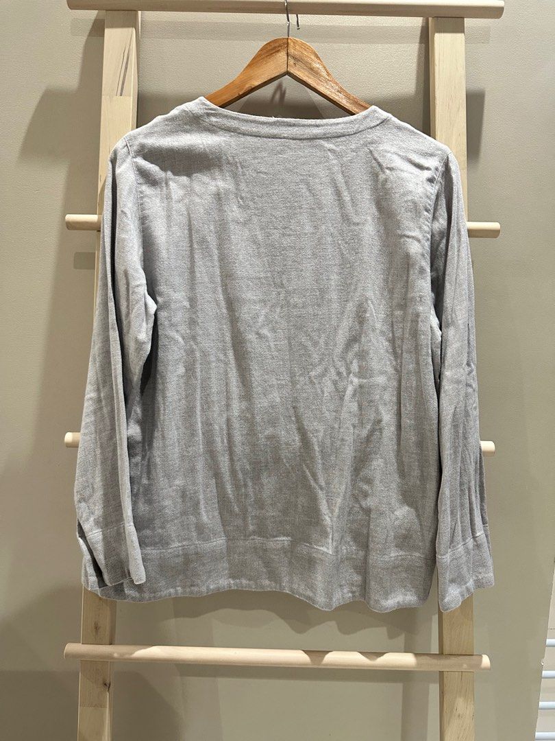 MUJI Long Sleeve Shirt (Category: Tshirts & Polo Shirts ) located in Quezon City. Submitted by alloriginalthrift (Listing ID 1415338909, Image 3). Description: - MUJI long sleeve shirt - Color: Light gray - Features: Round neckline, button cuffs & shoulder details - Material: 100% cotton - Fit: Relaxed - Perfect for casual wear - Measurements in photos Carefully washed and used. Very good condition..