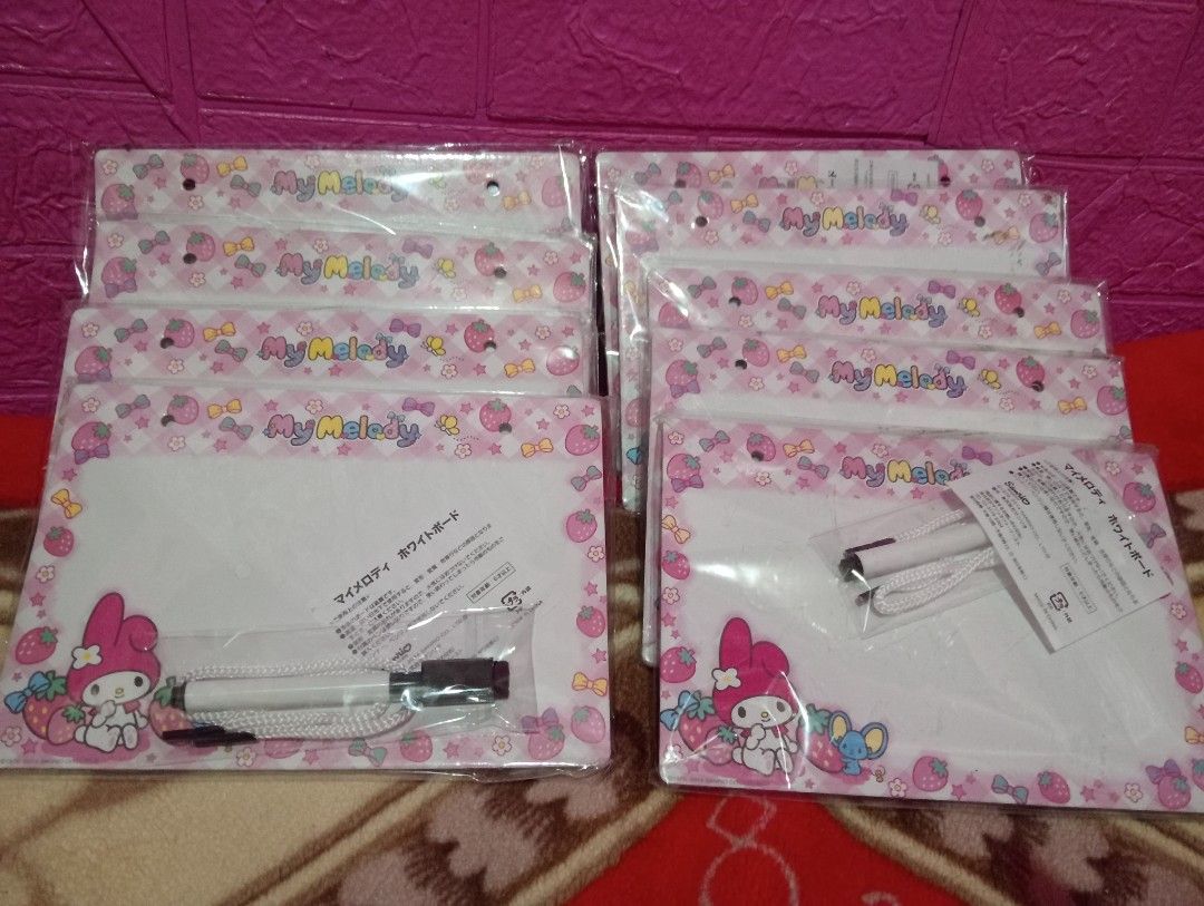 My Melody Whiteboard with Marker (Category: Stationery & School Supplies) located in Bulacan. Submitted by renasophiatoystore2020 (Listing ID 1415346589, Image 1). Description: - Brand new My Melody whiteboard - Comes with a marker and lanyard - Features a cute My Melody design with strawberries and bows - Rectangular shape - Ideal for notes, drawings, or reminders - Perfect for kids and My Melody fans - Still in original packaging.