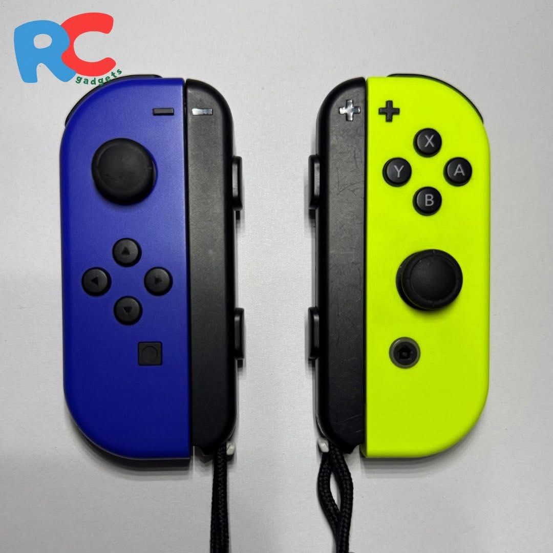 Nintendo Switch Joy-Con Controller (Red/Blue, Blue/Yellow) (Category: Controllers) located in Bacoor. Submitted by rcgadgets (Listing ID 1415413138, Image 2). Description: 𝐅𝐎𝐑 𝐒𝐀𝐋𝐄: 𝐒𝐖𝐈𝐓𝐂𝐇 𝐉𝐎𝐘-𝐂𝐎𝐍𝐒 🎮 Available Colors & Prices: • Neon Red & Blue – ₱1,700 • Blue & Neon Yellow – ₱1,500 Tested and fully functional Good condition 📍 Location: Bacoor, Cavite Meet-up or Lalamove (delivery fee shouldered by buyer) 📩 PM for inquiries