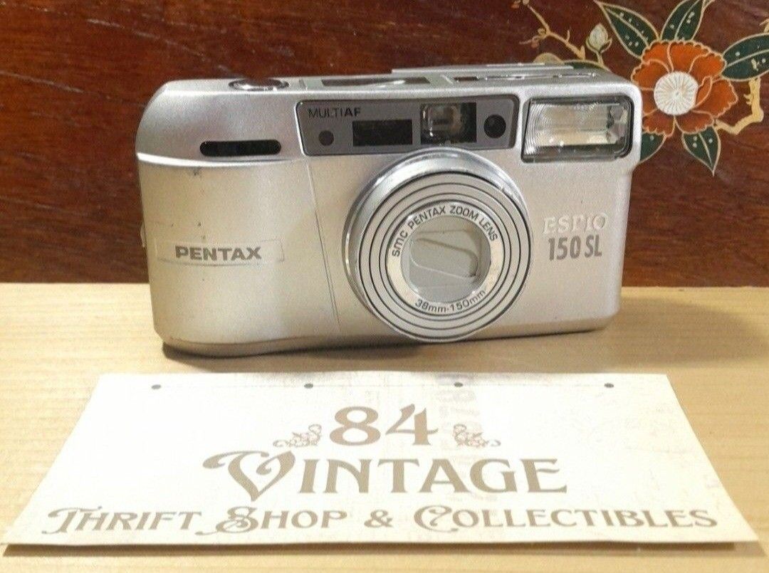 Pentax Espio 150 SL Read (Category: Cameras) located in Las Pinas. Submitted by 84vintage (Listing ID 1415407872, Image 1). Description: The Espio 150 SL is fine camera but expensive. This one has damaged LCD but still shoots fine and all functions are working. You have a fast AF even in dim lighting plus a long list of fine features only found on high end PnS. You can just lookup the functions online. Cheap entry to this Espio model at 85% off o