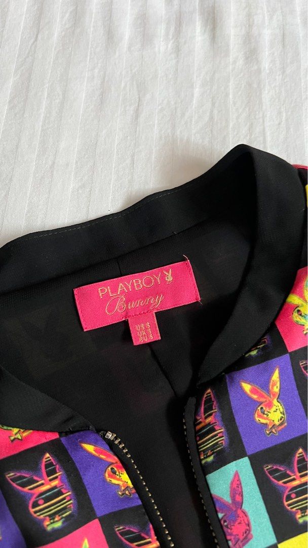 Playboy Bunny Jacket (Category: Coats, Jackets and Outerwear) located in Makati City. Submitted by annesexy (Listing ID 1415415633, Image 2). Description: - Playboy Bunny jacket - Colorful checkered pattern - Zipper closure with bunny charm - Black collar and cuffs - US size 4 - Vibrant and unique design.