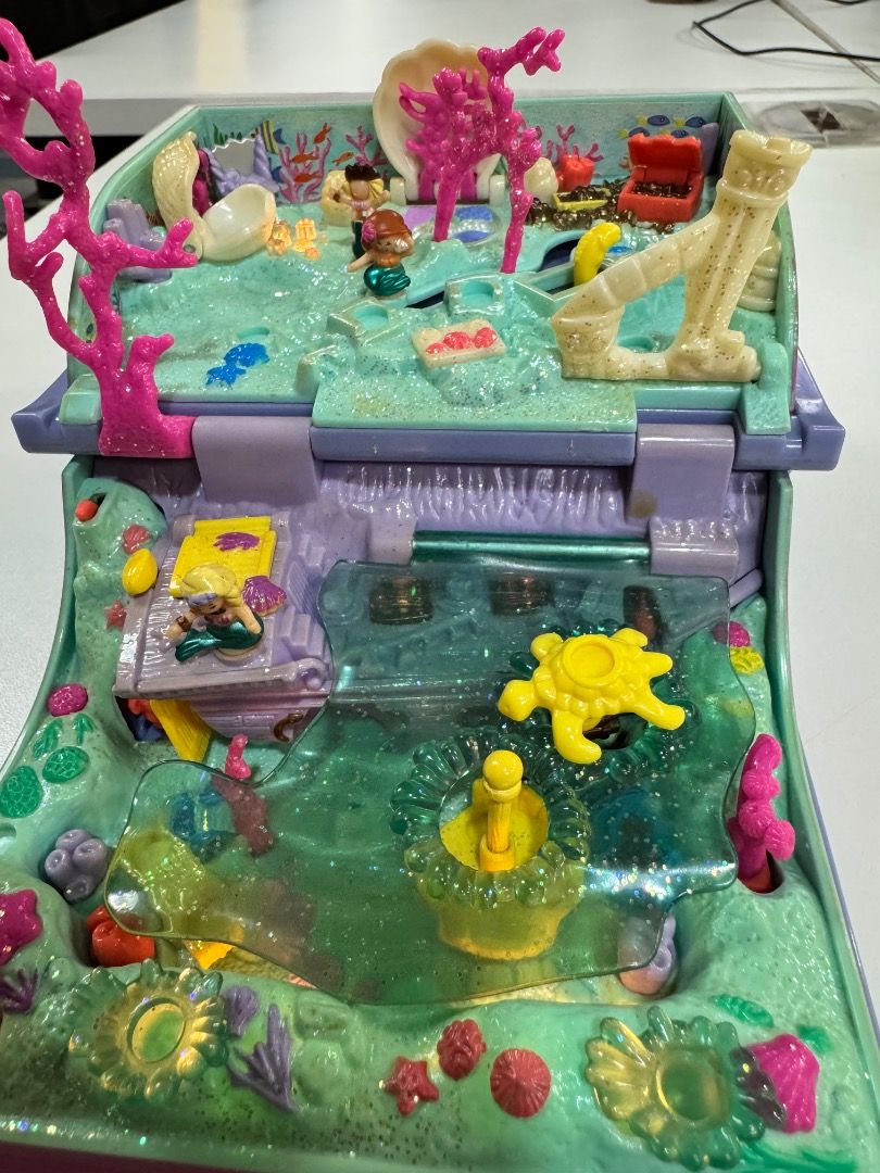 Polly Pocket Sparkling Mermaid Adventure (Category: Kids Toys) located in Taguig. Submitted by jeffong18 (Listing ID 1415407821, Image 1). Description: Pre-loved Polly Pocket Sparkling Mermaid adventure. Lights working, includes 3 mermaids and 1 seaturtle..