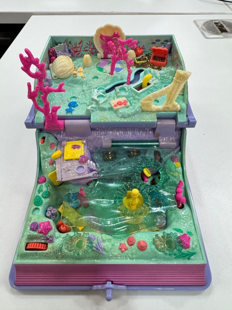 Polly Pocket Sparkling Mermaid Adventure (Category: Kids Toys) located in Taguig. Submitted by jeffong18 (Listing ID 1415407821, Image 2). Description: Pre-loved Polly Pocket Sparkling Mermaid adventure. Lights working, includes 3 mermaids and 1 seaturtle..