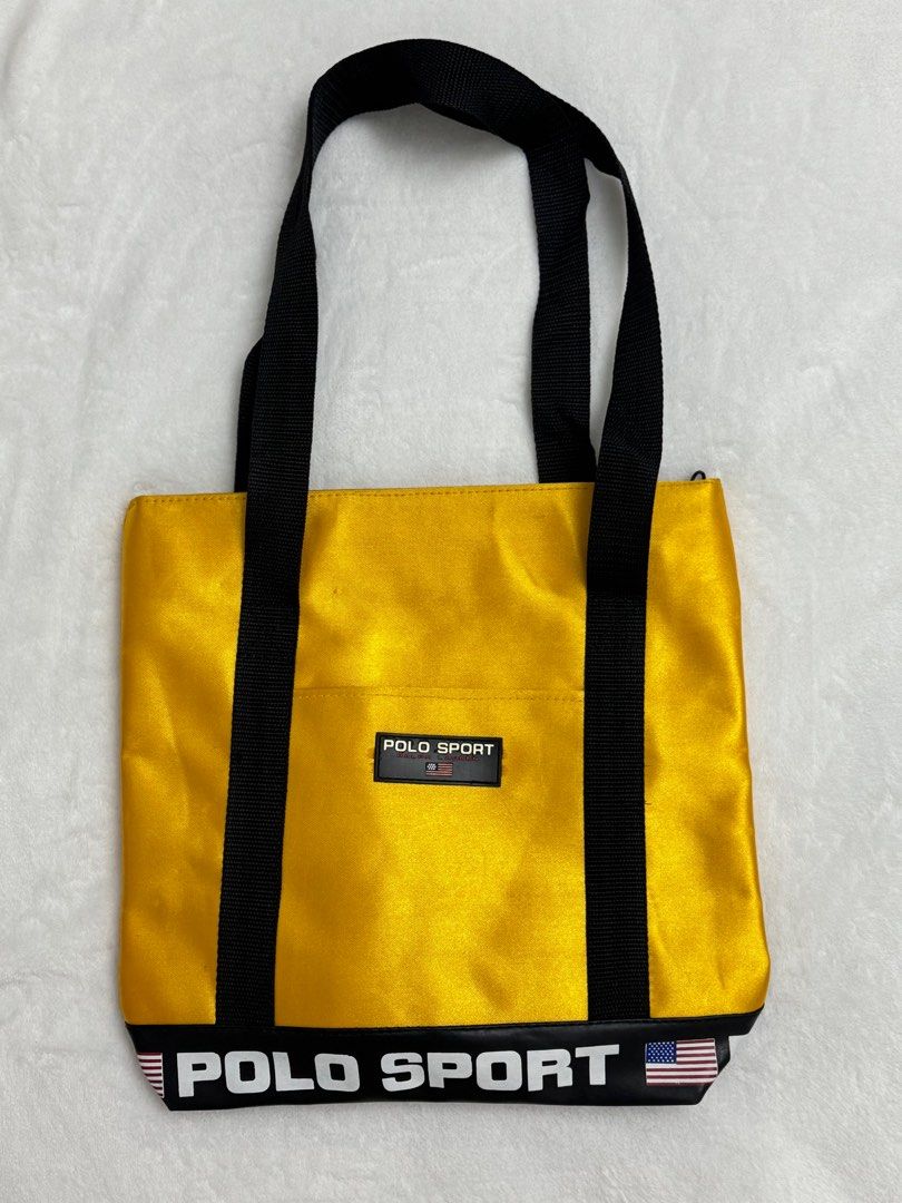 POLO SPORT Nylon Tote (Category: Sling Bags) located in Santa Rosa. Submitted by sunflora.ph (Listing ID 1415403262, Image 1). Description: 🌞Vintage POLO SPORT Ralph Lauren Nylon Tote Bag 🌞Color condition 10/10 🌞 🌞With slightly, almost none paint chipping on a few letter; check photos,PRISTINE INSIDES, like new straps and zippers, CLEAN EDGES 🌞Please see the photos and read description🙏 📍STA. ROSA LAGUNA, +100sf, Via J&T/lalamove .