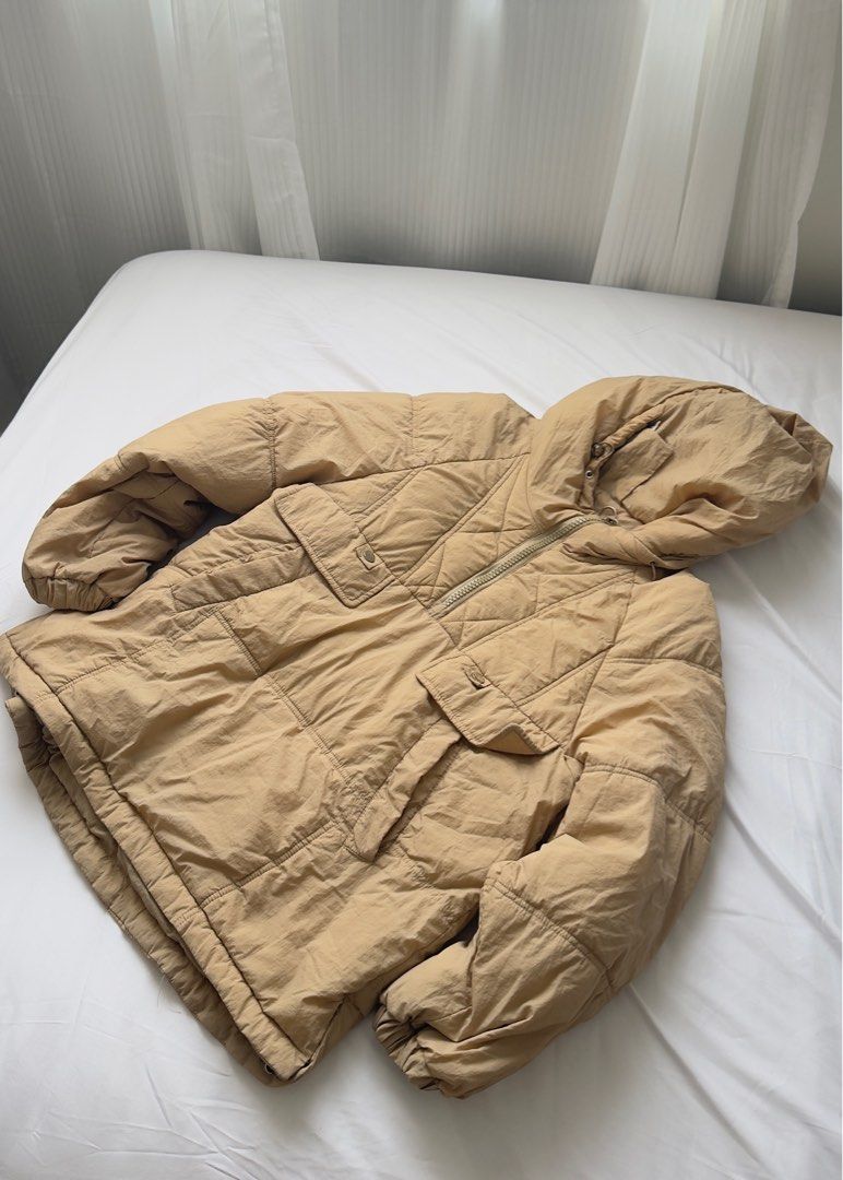 Puffer Jacket (Category: Coats, Jackets and Outerwear) located in Makati City. Submitted by clothique.ph (Listing ID 1415394439, Image 1). Description: - Lightly Used - Khaki in color - Fits to small size Purpose of selling: declutter.