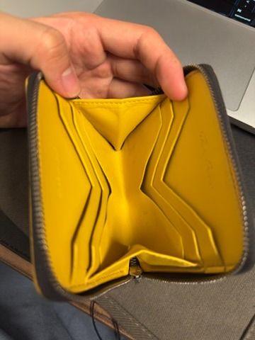 Rick Owens python wallet (Category: Wallets & Card Holders) located in Singapore. Submitted by blooxx (Listing ID 1415280718, Image 2). Description: - Authentic Rick Owens wallet bought from club 21 retail was $800 plus. - Zipped closure - Lemon yellow python leather - Multiple card slots - Made in Italy - Comes with original tags Used once only..