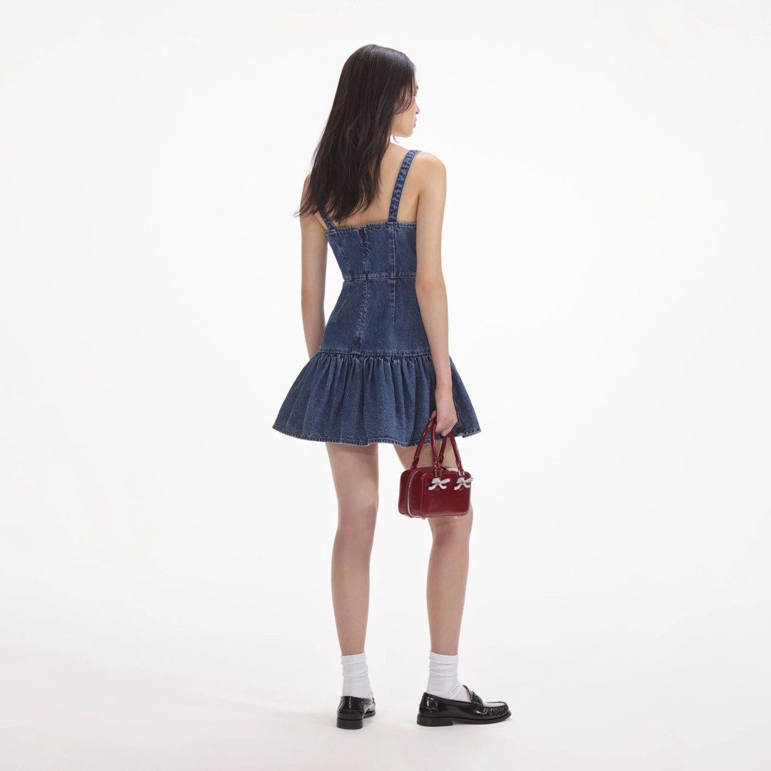 Self-Portrait Bow Denim Mini Dress (Category: Dresses) located in Makati City. Submitted by angelurlee (Listing ID 1415346173, Image 2). Description: Self-Portrait Bow Denim Mini Dress Size 4 Got this for 11,800 plus SF Worn once in Dubai Newly dry cleaned No flaws Super pretty! Rfs: decluttering .