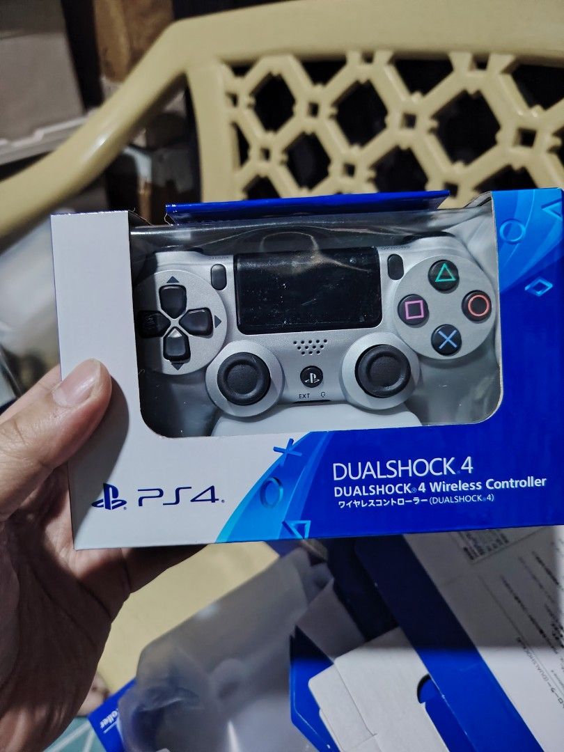 PS4 DualShock 4 Wireless Controller CLASS A (Category: Controllers) located in Manila. Submitted by lemsgadgetszone (Listing ID 1415380333, Image 2). Description: - Genuine Sony PS4 DualShock 4 Wireless Controller - Available Colors: Blue Camouflage, White, Black, Rose Gold - Brand New - Original Packaging - Perfect for PlayStation 4 gaming.