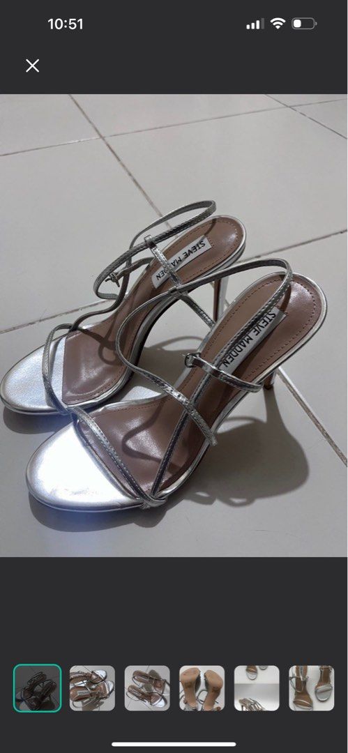 Steve Madden Silver Sandals (Category: Flats & Sandals) located in Manila. Submitted by absdeclutter (Listing ID 1415292114, Image 1). Description: - Steve Madden silver sandals - Strappy design - Buckle closure - Slender heels - Light-colored footbed - Suitable for special occasions.