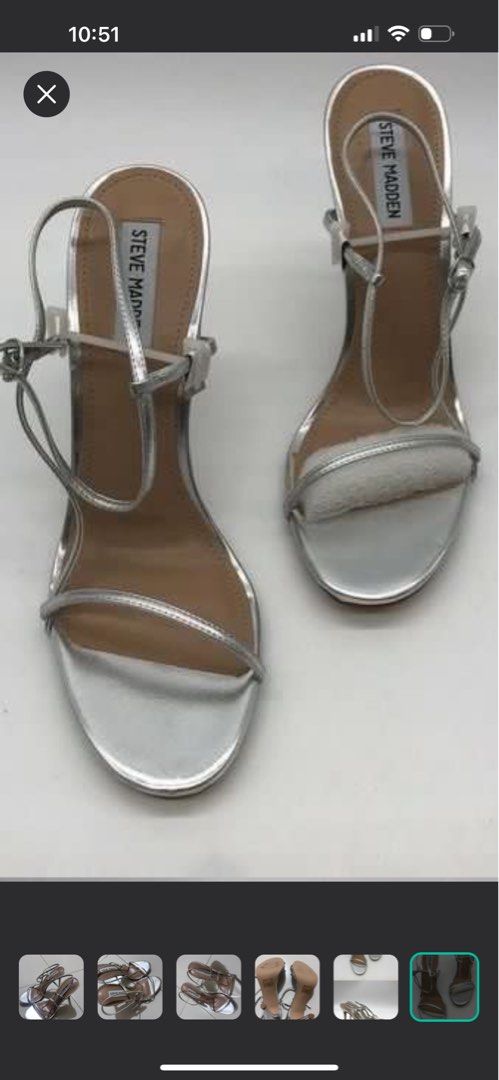 Steve Madden Silver Sandals (Category: Flats & Sandals) located in Manila. Submitted by absdeclutter (Listing ID 1415292114, Image 2). Description: - Steve Madden silver sandals - Strappy design - Buckle closure - Slender heels - Light-colored footbed - Suitable for special occasions.