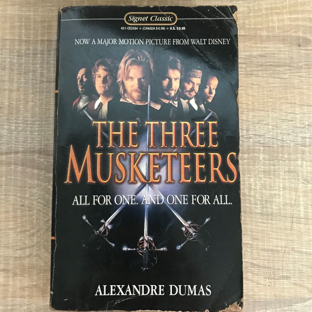 The Three Musketeers by Alexandre Dumas (Category: Storybooks) located in Mandaluyong City. Submitted by Laney223 (Listing ID 1415285627, Image 1). Description: * 'The Three Musketeers' by Alexandre Dumas * Signet Classic edition 1991 * Features movie cover imagery * Yellowing of pages due to aging * A must read classic novel - MOP: Gcash/Bank Transfer - Courier: Grab/Lalamove/LBC/J&T Buyer's expense .